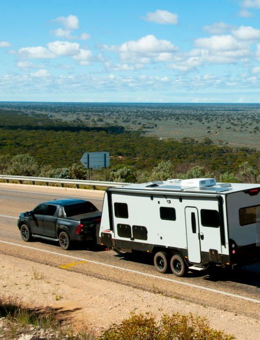 Camper being pulled by truck